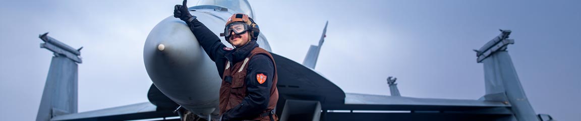 VFA-87 Sailor Signals Jet Ready For Launch