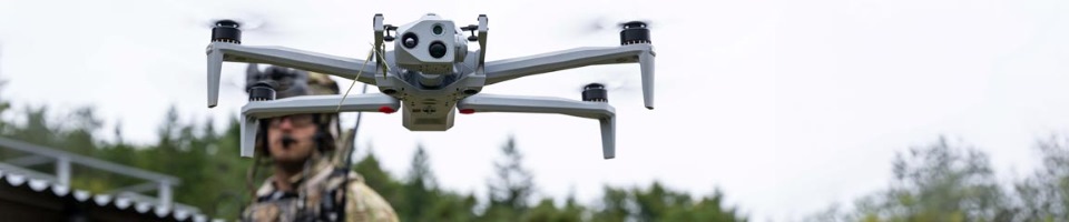 Air Force Tactical Air Control Party Airmen assigned to the 57th Rescue Squadron flies a drone 